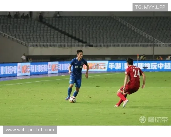 上港与河南建业激战正酣比分悬念引人关注赛事精彩纷呈